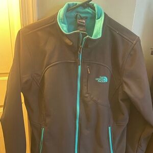 The North Face Women's Black Jacket with Teal Accents